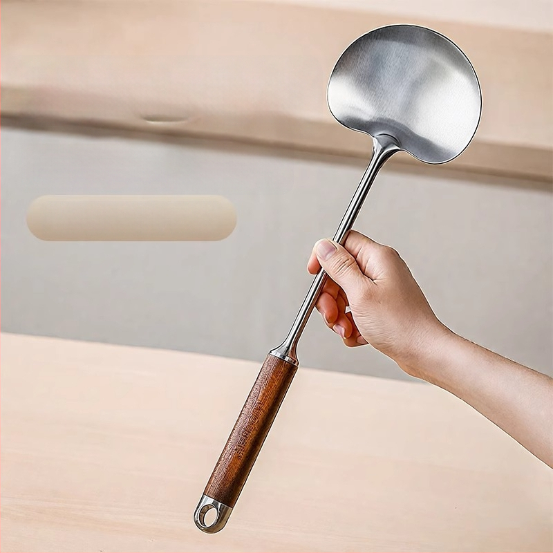 Grybo formos nerūdijančio plieno kepimo mentele; neprilipuojanti, neslydinti, atspari aukštoms temperatūroms, apsauganti nuo nudegimų; rankena iš nerūdijančio plieno