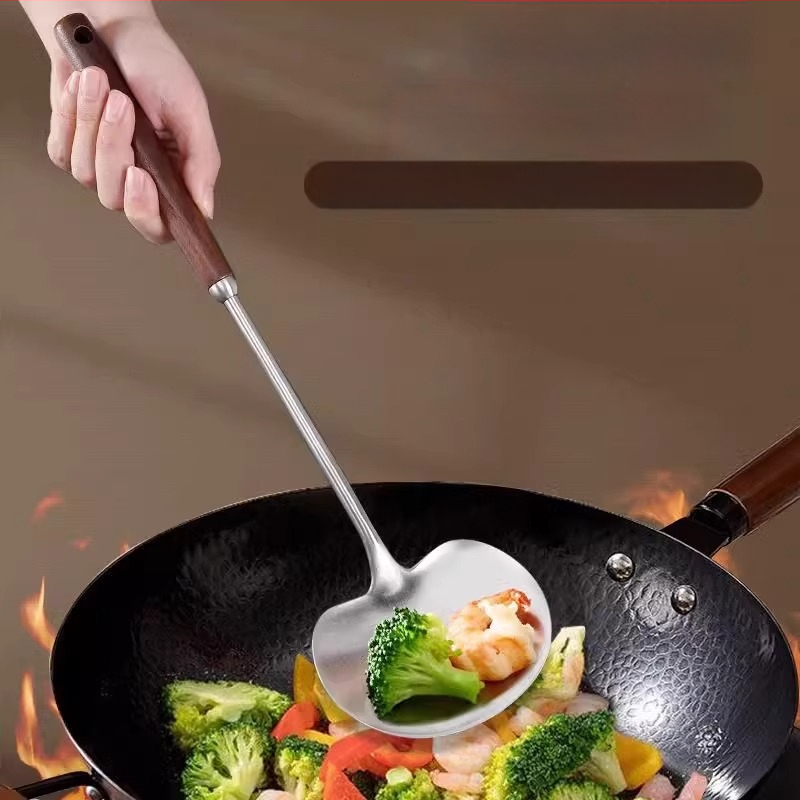 Grybo formos nerūdijančio plieno kepimo mentele; neprilipuojanti, neslydinti, atspari aukštoms temperatūroms, apsauganti nuo nudegimų; rankena iš nerūdijančio plieno