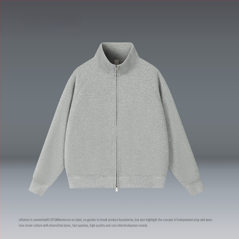 Kardigán álló gallérral, cipzárral, laza szabású, poliészter 51–70%.