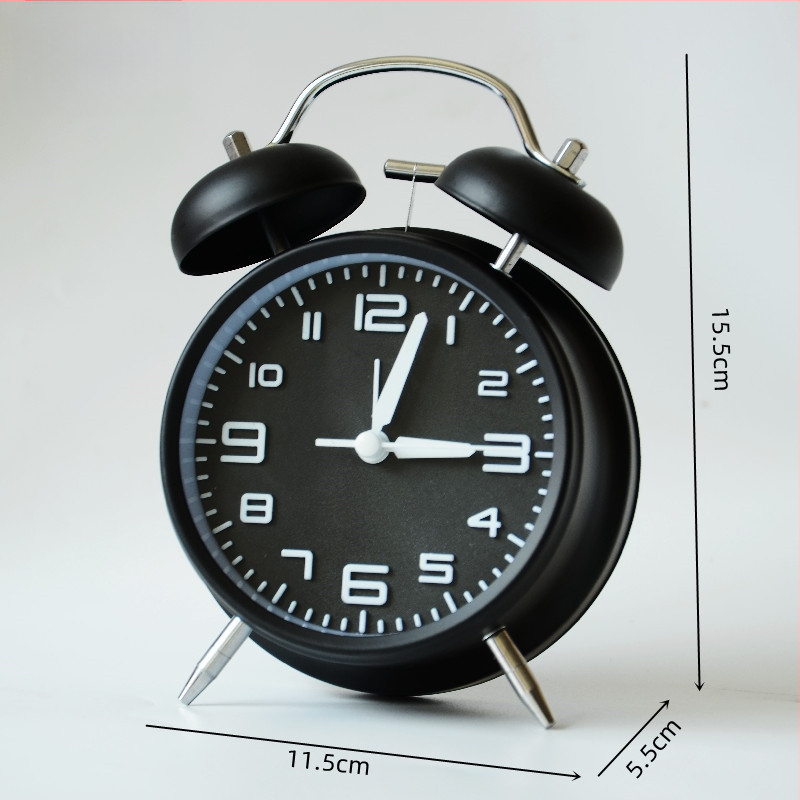 Kovový budík, napájaný batériou, elektronický pohyb, analógový ciferník s číslami, jednostranný, kovové puzdro a ciferník, moderný dizajn, zabudované budenie.