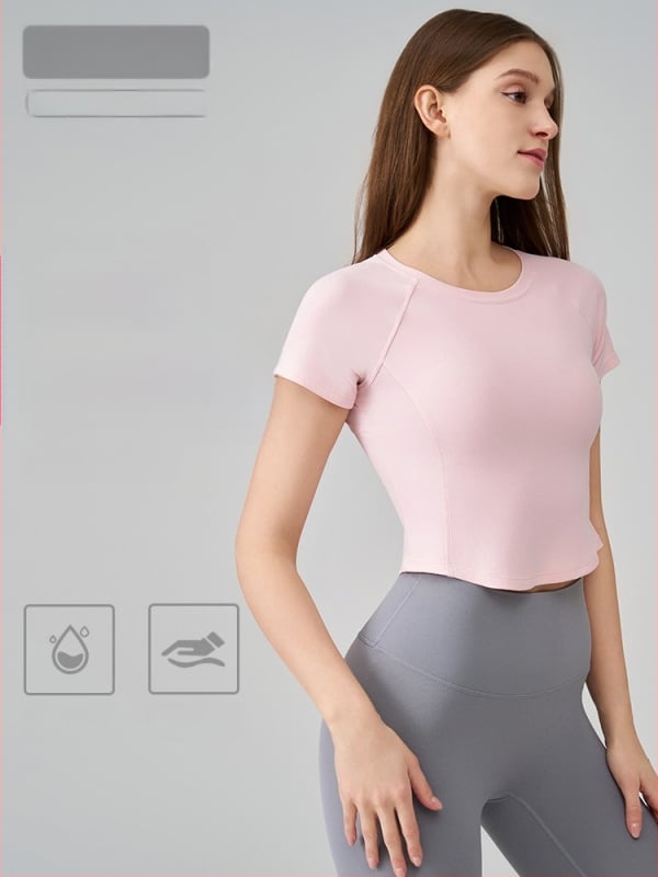 Moterų SNU Naked-Feel sportinis topas – siauras pjūvis, trumpomis rankovėmis, liemens ilgis, nailonas 91% / spandeksas 9%, skirtas bėgimui, fitnesui ir jogai