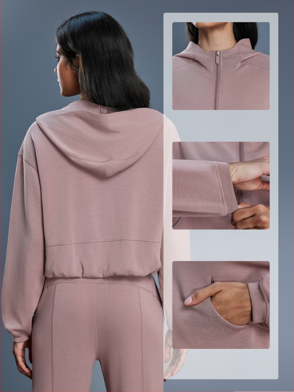 Női kapucnis cipzáros pulóver, lazán szabott, futáshoz és edzéshez, őszi-téli szezon; pamutkeverék anyag 52% poliészter; belső bélés pamut.