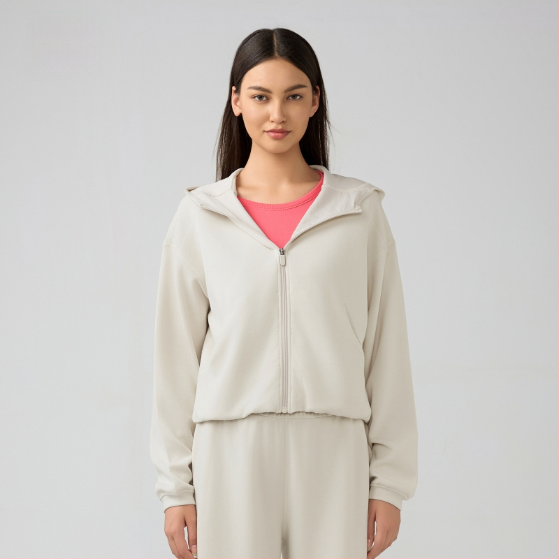 Női kapucnis cipzáros pulóver, lazán szabott, futáshoz és edzéshez, őszi-téli szezon; pamutkeverék anyag 52% poliészter; belső bélés pamut.