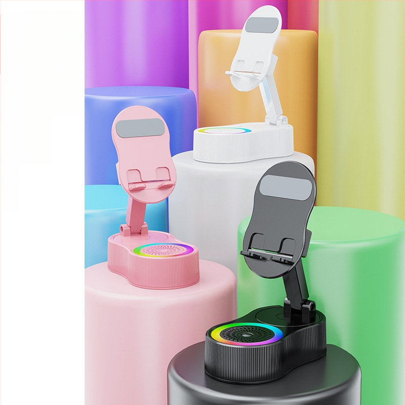 Tālruņa turētājs ar iebūvētu akumulatoru un bezvadu Bluetooth skaļruņu sistēmu — Bluetooth 5.3, akumulatora jauda 1200–2000 mAh, jauda 5W, frekvenču diapazons 100 Hz–20 kHz, darbības attālums 10 m