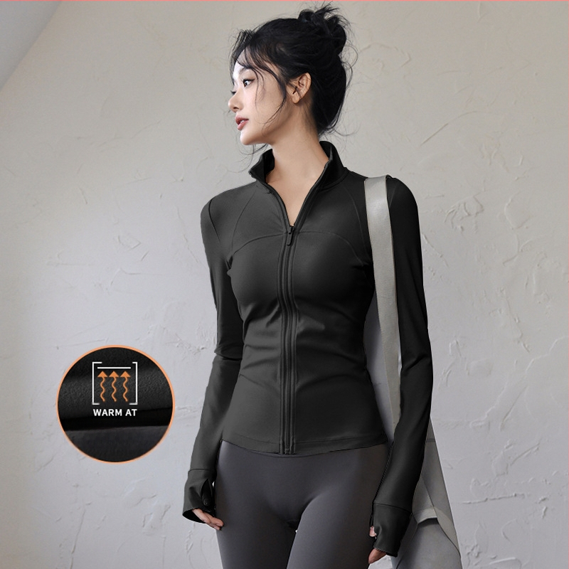 Ženski top za jogu i fitness – uski kroj, dugi rukavi, brzo sušeći materijal; tkanina: mješavina kemijskih vlakana, sastav tkanine: 82,5% poliester; podstava: Spandex, sadržaj podstave: poliester