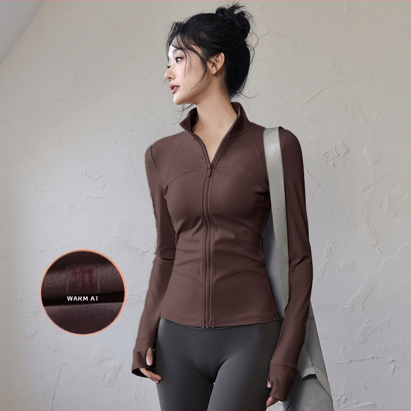 Ženski top za jogu i fitness – uski kroj, dugi rukavi, brzo sušeći materijal; tkanina: mješavina kemijskih vlakana, sastav tkanine: 82,5% poliester; podstava: Spandex, sadržaj podstave: poliester