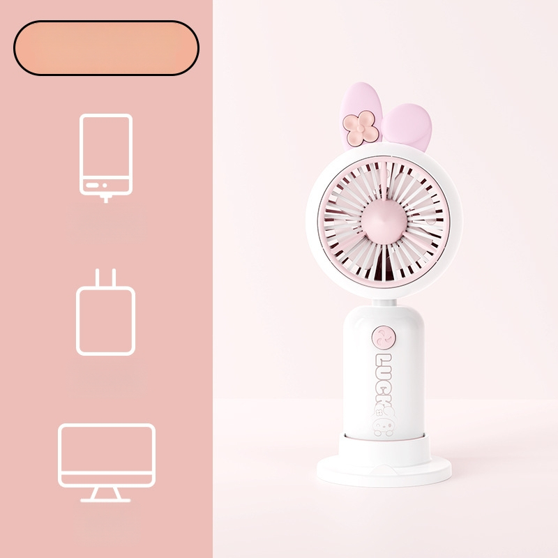 Rokas karikatūras dizaina pūtējs ar drukātu rokturi un karikatūras ausīm, uzlādējams, iebūvēta akumulatora kapacitāte 100-300 mAh, 5V, 5W, troksnis 36-45 dB, akumulatora darbības laiks 0-1 h