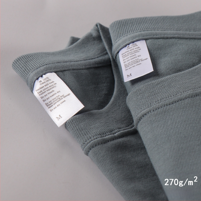 100% pamutból készült póló, kereknyakú, rövid ujjú, laza szabás, nehéz anyag