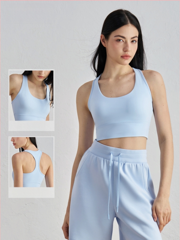 Joga sportinė liemenėlė su krūtinės pagalvėlė – 3/4 kupolas, vidutinio formos kaušelis, racerback su fiksuotomis dvigubomis petnešomis, audinys nailonas/elastanas