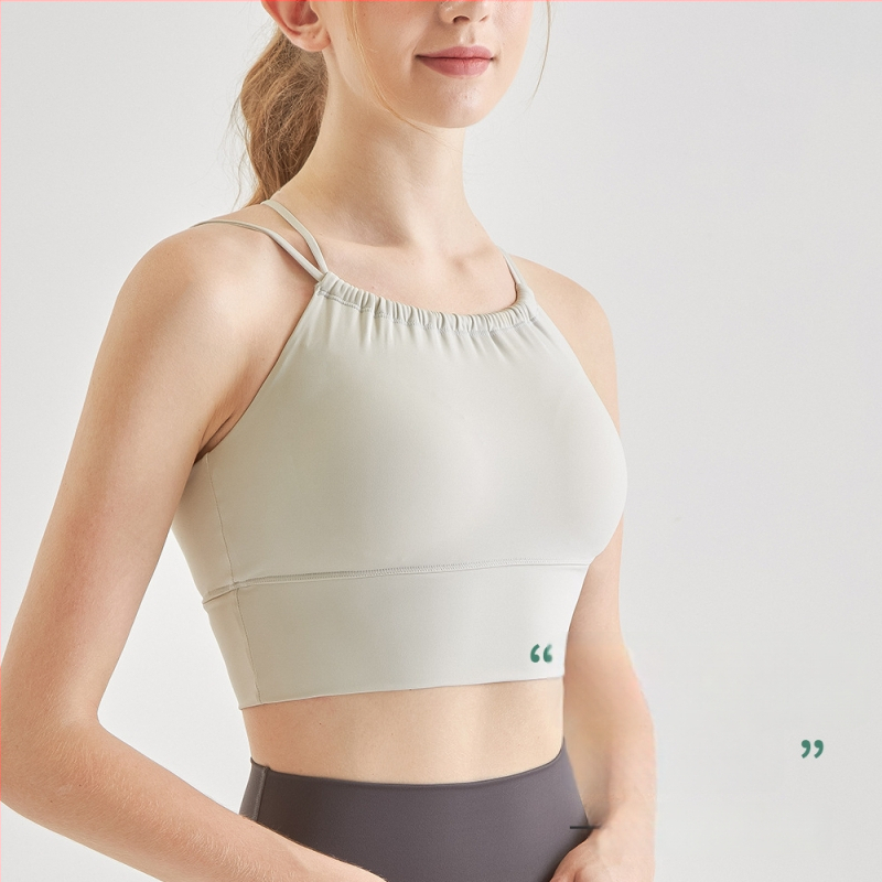 Sportinė liemenėlė; push-up ir atsparus smūgiams; 3/4 puodeliai; vidutinio puodelio forma; pagrindinė medžiaga 75% nailonas, pamušalas 25% spandeks