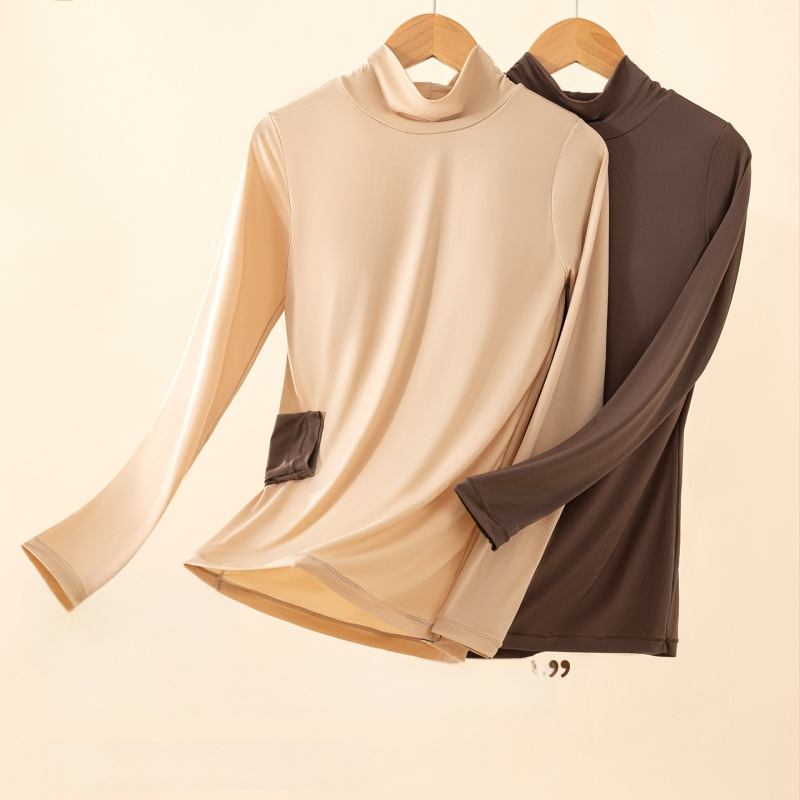 Moterų nailono topas su hialurono rūgštimi, aukšta elastinga, įmontuotos krūties pagalvėlės, pusiau aukštas kaklas, plonas audinys, ilgos rankovės