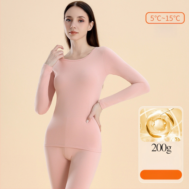 Moterų terminis komplektas: bazinio viršaus ir kelnių komplektas, medvilnė, vidutinio tankio 181–200 g/m², apvali kaklo linija, ilgos rankovės, vieno sluoksnio