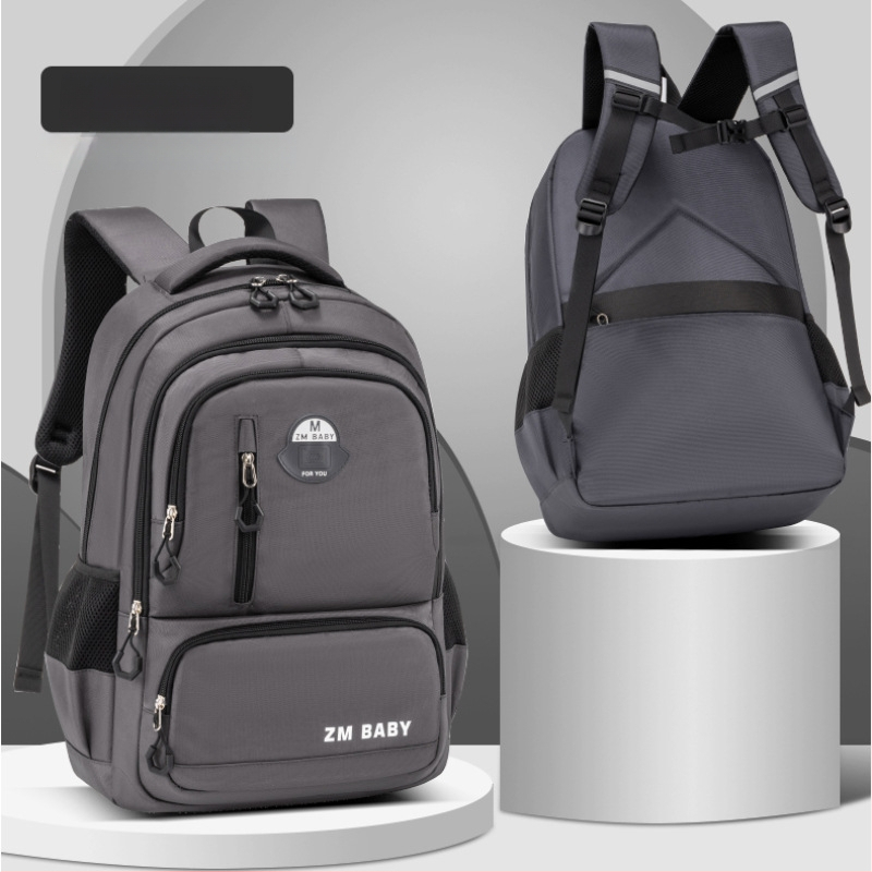 Skolas soma 1.–3. klases skolēniem – poliesters; elpojoša, ūdensnecaurlaidīga, ultra viegla, izturīga ar muguras aizsardzību; bērniem draudzīgs dizains; gaisa spilvenu siksnas