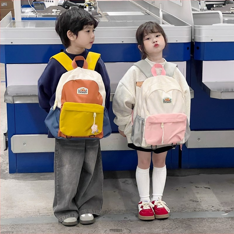 Unisex nailonist kerge lasteaia seljakott kõverate õlarihmadega, ühendatud muster, lõbus karikatuurstiil