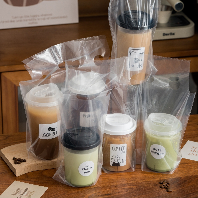 Vienkartinė gėrimų išsinešimui pakuotė, skirta vienam arba dviem puodeliams, skaidri, poliesterio medžiaga, pakuotė 50 vnt. kiekvienam puodelio tipui, tinkama pieno arbatai, kavai, citrinų arbatai ir vaisių arbatai