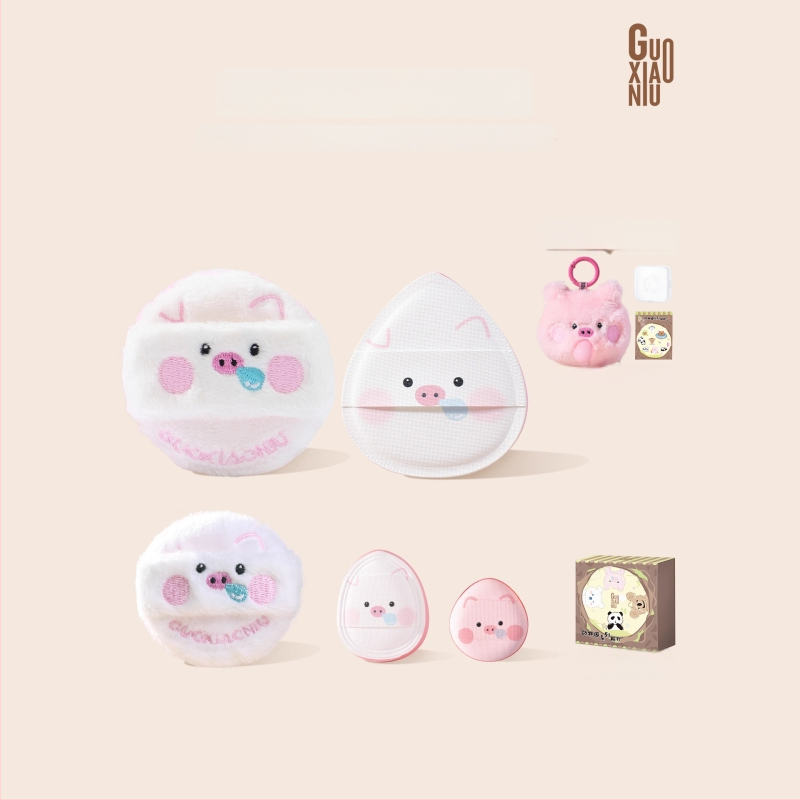 Guo Xiaoniu Dārza Dzīvnieku Sērija – Pūderu pūtēju komplekts mitrai un sausai lietošanai, iekļauj 2 pūkotas pūces, 1 marshmallow pūku, 2 pirkstu pūķi, uzglabāšanas kārba; Materiāli: poliesters, sūklis, ruby cell, elastīgais sūklis, PU āda