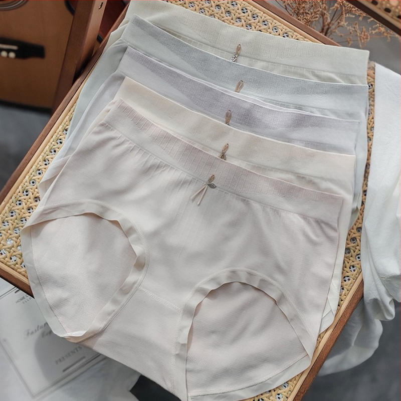 Naiste keskjoones püksid, ilma küljeõmblusteta, hingav regenereeritud tselluloosi kiududest kangas; kroö