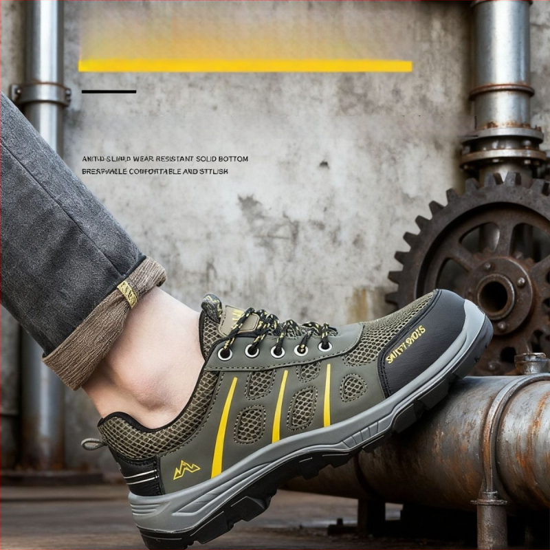 Drošības darba apavi ar perforācijas un triecienskaitlisko aizsardzību; virsējā no mikrofibra ādas; PU zole; zems augums; četras sezonas; unisex.