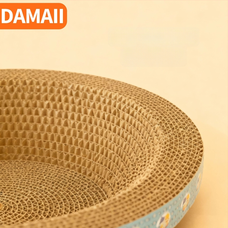 DAMAII viļņota kartona kaķu skrāpēšanas trauka – apaļa skrāpēšanas trauka, izturīga pret nolietošanās, bez pūkām, kaķu rotaļlieta karikatūras stilā