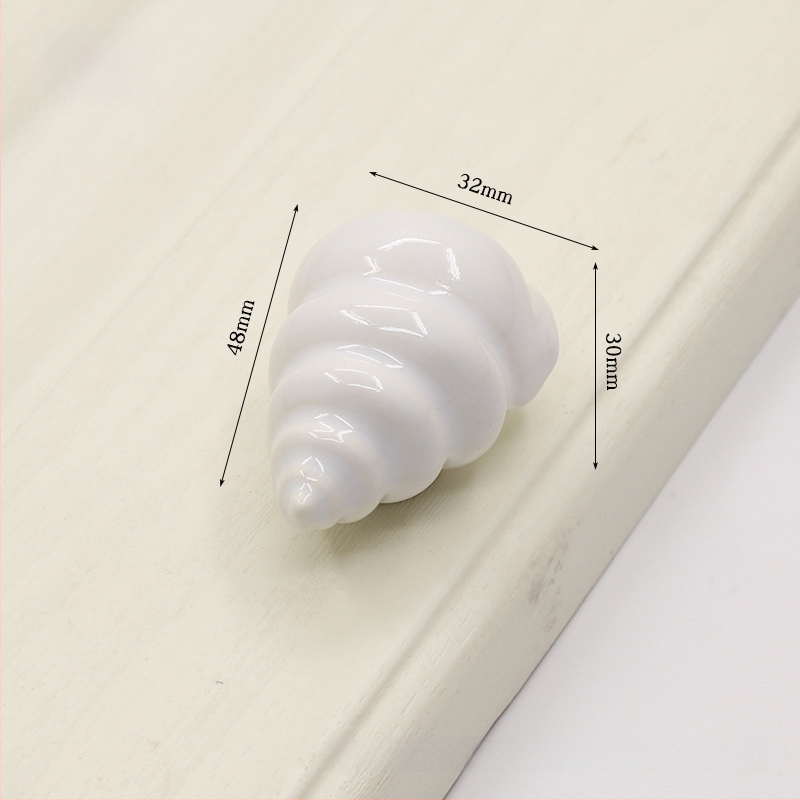 Kriauklės formos spintelės rankena | Keramika ir varis | Sfėrinė forma | Slėptas montavimas | Slėginio liejimo technologija | Modelis 1362