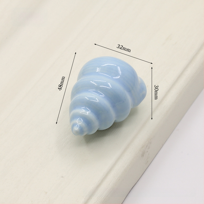 Kriauklės formos spintelės rankena | Keramika ir varis | Sfėrinė forma | Slėptas montavimas | Slėginio liejimo technologija | Modelis 1362