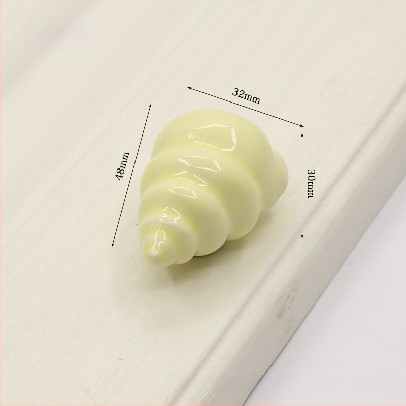 Kriauklės formos spintelės rankena | Keramika ir varis | Sfėrinė forma | Slėptas montavimas | Slėginio liejimo technologija | Modelis 1362