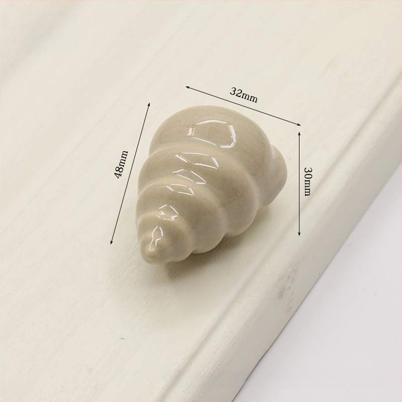 Kriauklės formos spintelės rankena | Keramika ir varis | Sfėrinė forma | Slėptas montavimas | Slėginio liejimo technologija | Modelis 1362