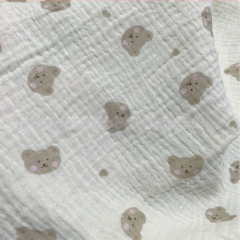 Medvilninis dvigubos muslin audinys su lokio atspaudu pižamoms ir namų drabužiams; 100% medvilnė; cilindrinis dažymas; augalinis atspaudas