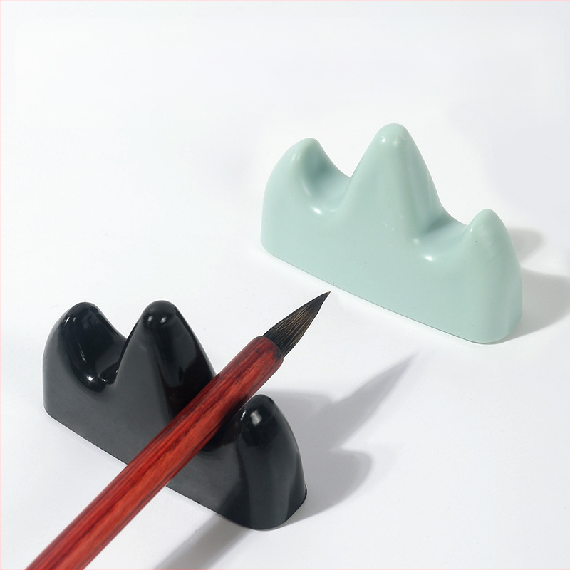 Plastikinis rašiklio laikiklis pradedantiesiems, kalnų formos dizainas (Modelis: Tgj 00bg 010050; Prekės ženklas: Tt/practice every day; Medžiaga: plastikas)