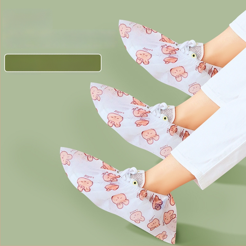 Vienkartiniai spausdinti avalynės gaubteliai iš neaudinio, dulkių atsparūs, storesni, pritaikyti dirbtuvėms ir klasei