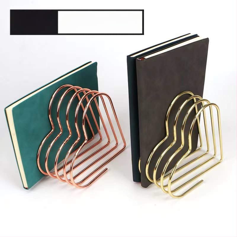 Išsitiesiantis širdies formos metalinis knygų laikiklis ant stalo – kompaktiškas žurnalų laikymo laikiklis. Modelis: Shrink bookend; Prekės kodas: Retractable bookend; Medžiaga: Metalas; Grynasis svoris: 275 g