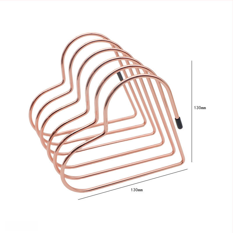 Išsitiesiantis širdies formos metalinis knygų laikiklis ant stalo – kompaktiškas žurnalų laikymo laikiklis. Modelis: Shrink bookend; Prekės kodas: Retractable bookend; Medžiaga: Metalas; Grynasis svoris: 275 g