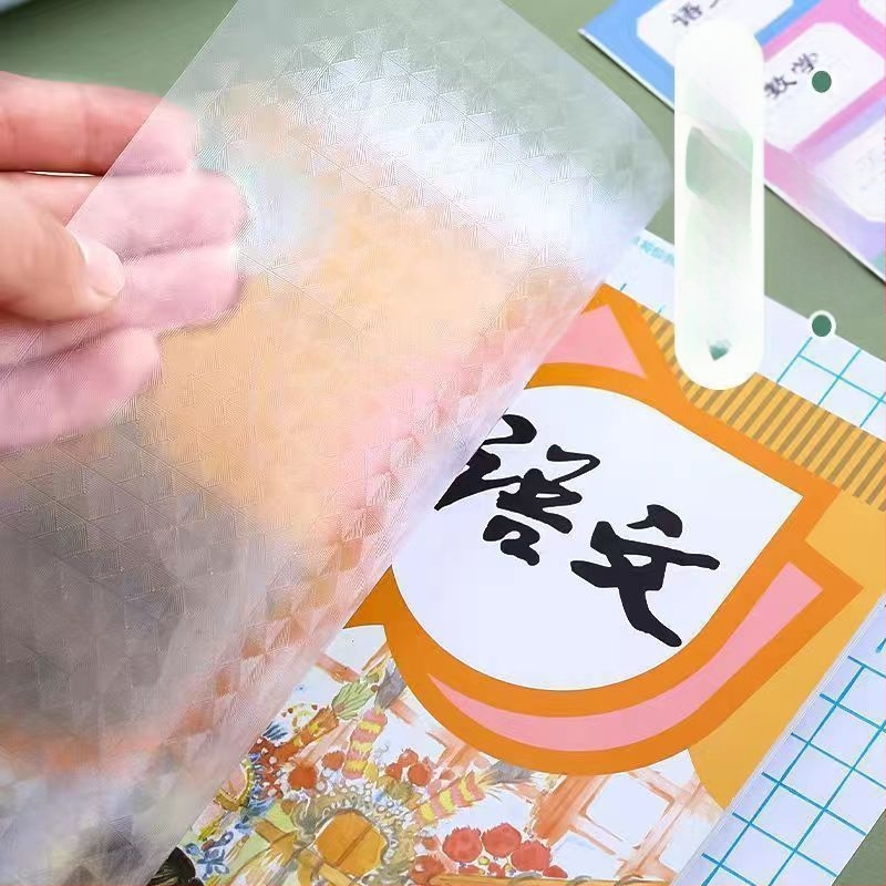 Bieza caurspīdīga pašlīmējoša grāmatu vāciņa ar matētu dimantu tekstūru, ūdensizturīga aizsardzības vāciņa grāmatām