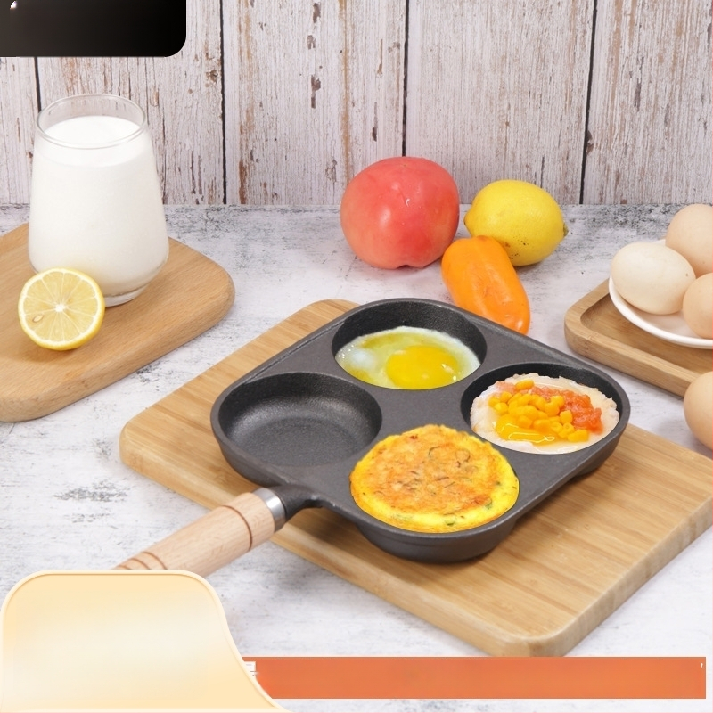 Ketausinė keptuvė su keturiomis skylėmis, be paviršiaus, plokščiu dugnu, skirta omletoms, blynom ir kiaušinių burgeriams