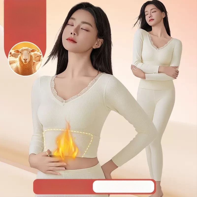 Moterų terminių apatinių komplektas su įdėta krūtinės pagalvėle, stora poliesterio medžiaga, V formos iškirptė, ilgomis rankovėmis viršutinė dalis ir kelnaitės (polieasterio audinys; įdėta krūtinės pagalvėlė; V- iškirptė; stora medžiaga)