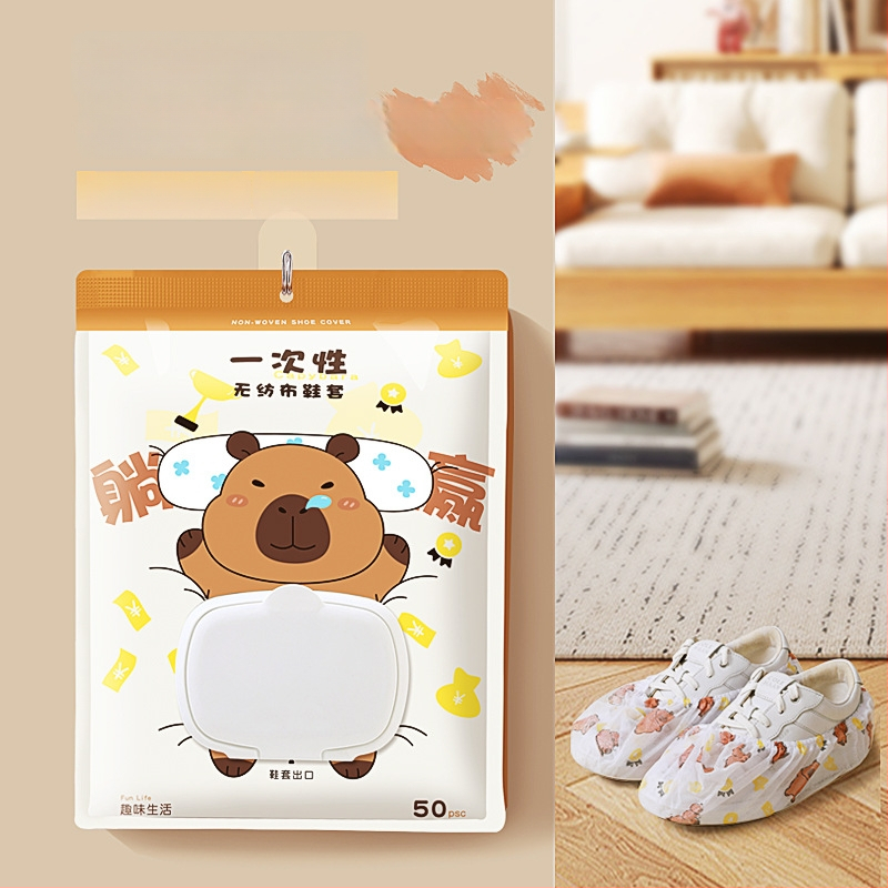 Vienkartiniai avalynės užklotai iš neaudinio medžiagos su kapibara raštu, elastinis žiedas ir tempimo raištis, namų naudojimui, įprastas storis