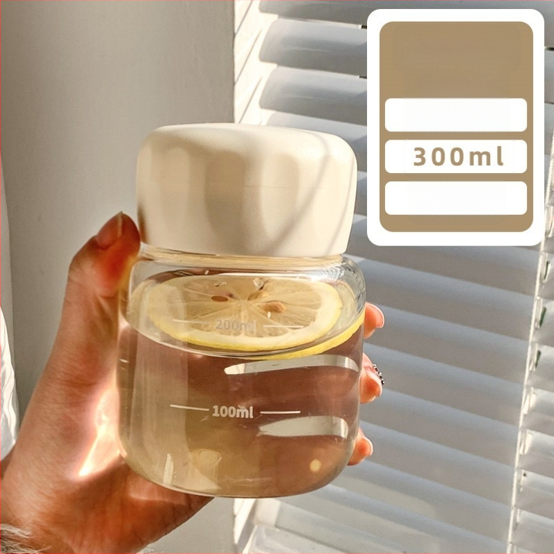 Stiklinė vandens taurelė su gaubteliu, šiuolaikinio minimalistinio dizaino, logotipo spauda, vientisa stiklo konstrukcija, atspari aukštoms temperatūroms