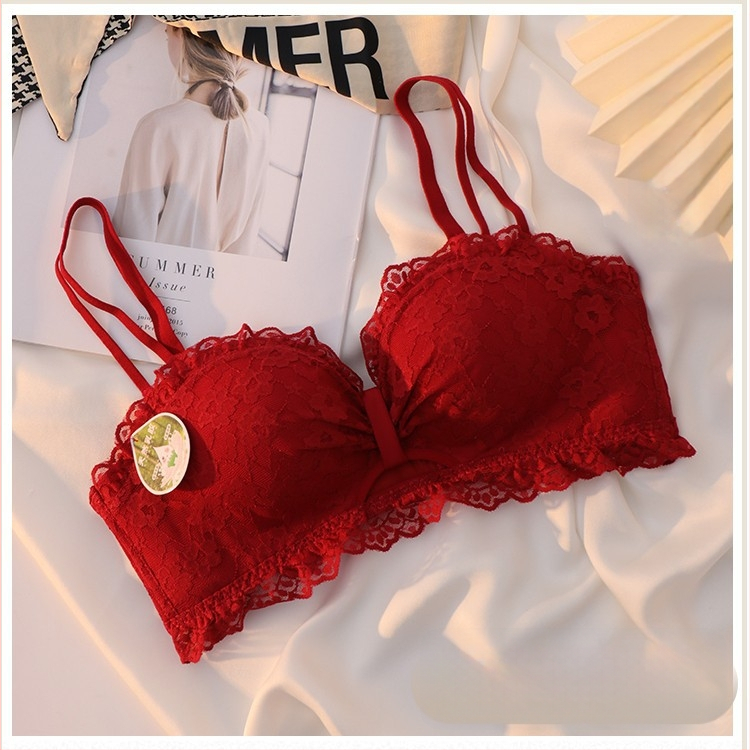 Be vielos liemenėlė iš nailono, su savilkimo funkcija, vidinis sluoksnis iš Spandex, nuimamos dvigubos pečiai, nugaroje užsegimas su keturiais užsegimo eilėmis, kaušelių forma: viršuje plonas, apačioje storas