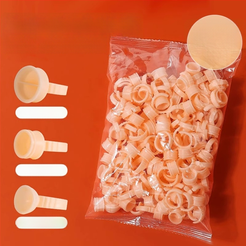 Ühekordsed silikoonist rõngakausid poolpüsiva tätoveeringu jaoks, komplekt 100 tk., 75 g pakendis