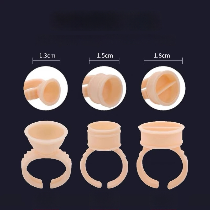 Ühekordsed silikoonist rõngakausid poolpüsiva tätoveeringu jaoks, komplekt 100 tk., 75 g pakendis