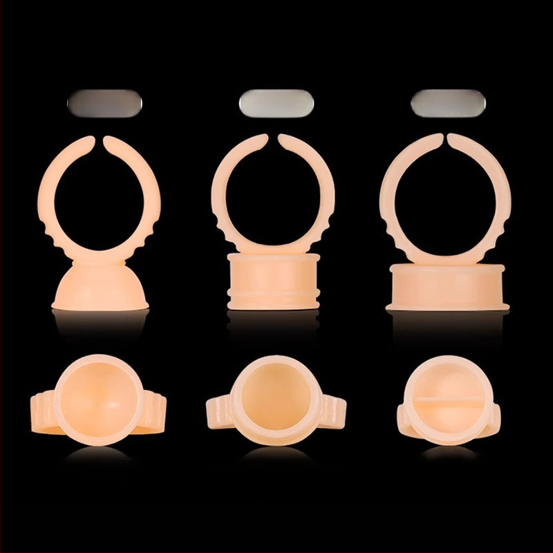 Ühekordsed silikoonist rõngakausid poolpüsiva tätoveeringu jaoks, komplekt 100 tk., 75 g pakendis