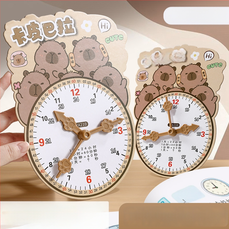 Švietėjiškas laikrodžio modelis laikui įsisavinti – kartonas/plastikas, skirtas 7–14 metų vaikams; pakuotė tinkliname maiše; skatina intelektinę plėtrą, praktinį mokymą ir interaktyvią žaidą.