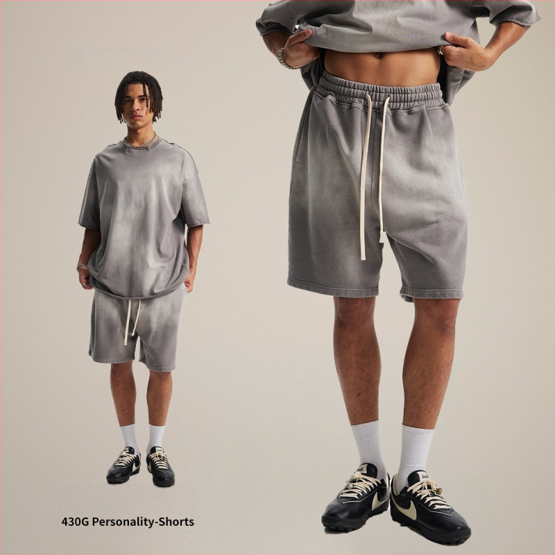 Vīriešu šorti no 100% kokvilnas, brīvās piegriezums, spray-dye mazgāšanas efekts retro izskatam, elastīgā josta (Pavasaris 2025)