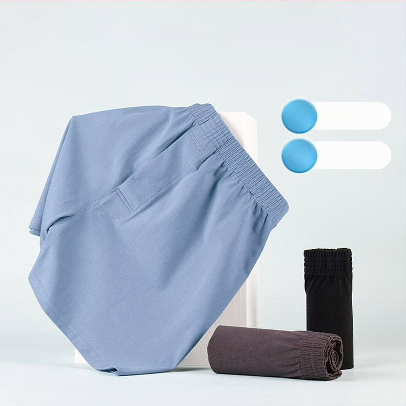 Meeste puuvillased bokserid, vaba lõige, keskmine talje, kootud kangas, 90–95% puuvill.