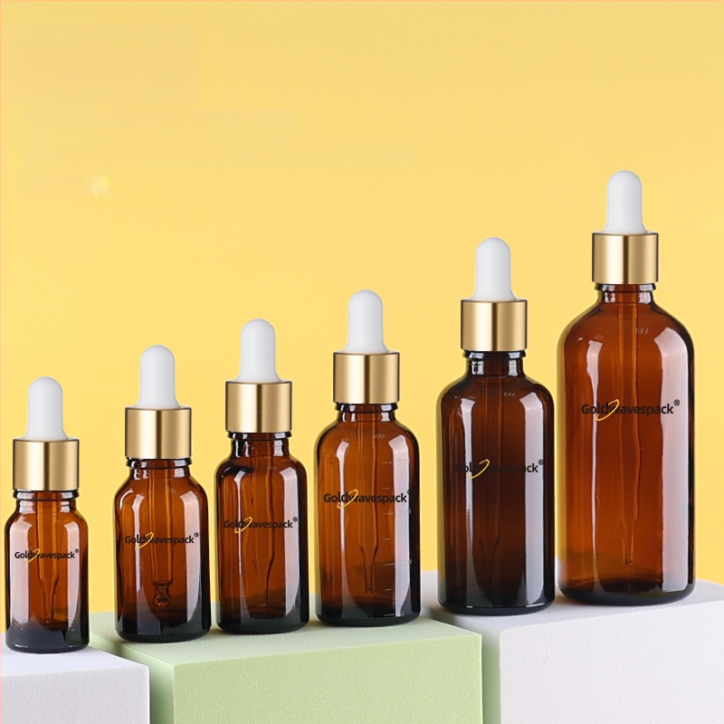 Pritaikytas stiklinis kosmetikos buteliukas su anti-vagystės lašintuvu, 18/410 kaklelis, spauda ir elektroplatinimas, skirta grožio pakuotei