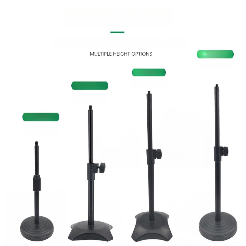 Stalo laikiklis telefonui ir mikrofonui su reguliuojamu apšvietimu tiesioginiams transliavimams, apvalios diskos pagrindas, metalinė vamzdinė konstrukcija.