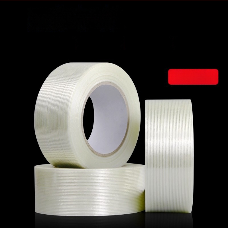 Stiklo pluošto juosta – Aukšta sukibimo jėga, izoliacija, temperatūros atsparumas (Plotis: 10–1020 mm; Ilgis: 50 m; Storis: 130 μm; Pagrindinė medžiaga: pluoštas; Klijavimo sistema: gumos klijai)