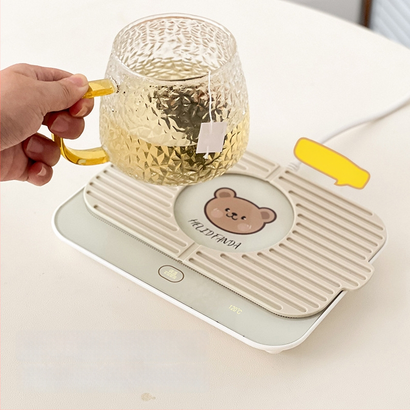 Gudra podstavka ar konstantu temperatūru mājas un biroja vajadzībām – ABS korpuss, ārēja barošanas avots, skārienvadība, automātiska izslēgšana, 6 temperatūras līmeņi