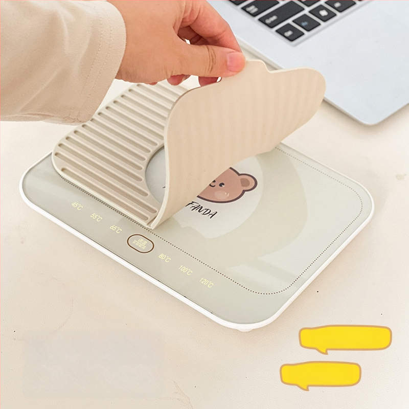 Gudra podstavka ar konstantu temperatūru mājas un biroja vajadzībām – ABS korpuss, ārēja barošanas avots, skārienvadība, automātiska izslēgšana, 6 temperatūras līmeņi