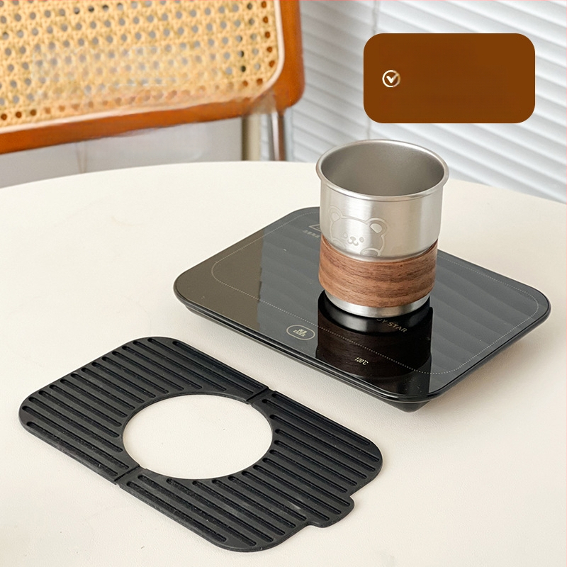 Gudra podstavka ar konstantu temperatūru mājas un biroja vajadzībām – ABS korpuss, ārēja barošanas avots, skārienvadība, automātiska izslēgšana, 6 temperatūras līmeņi